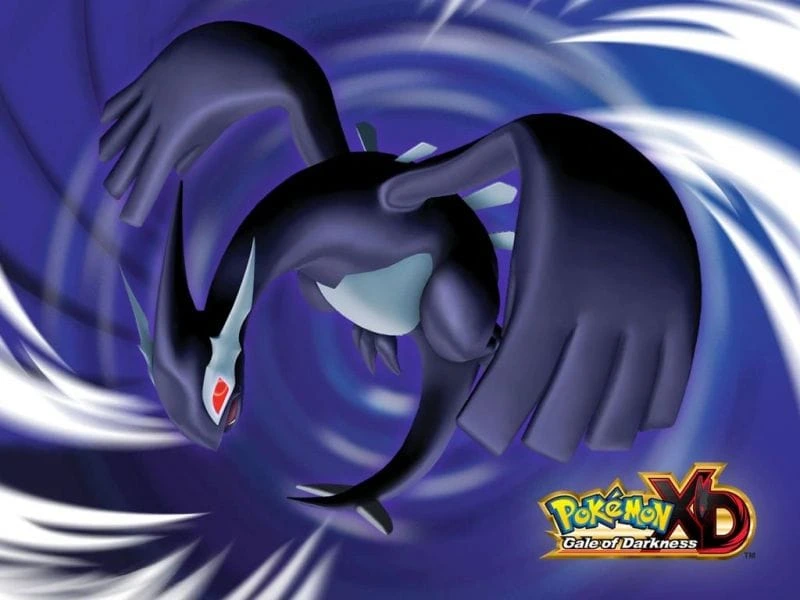 Lugia Oscuro frente a un remolino azul junto al logotipo original de Pokémon XD: Gale of Darkness.